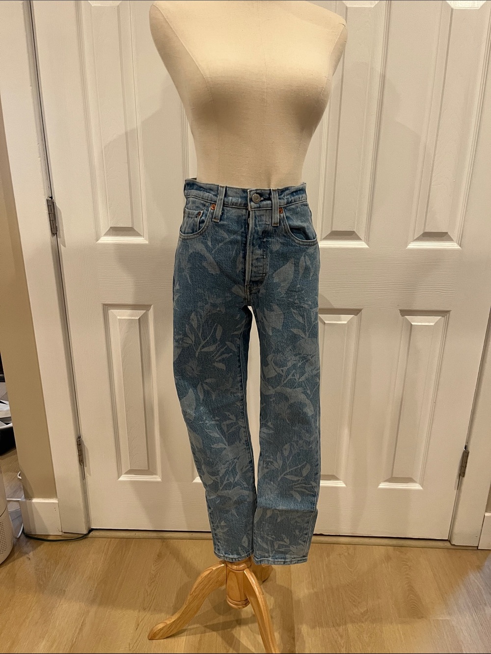 Levi's Washed Blue High-Rise Jeans with Subtle Floral Print